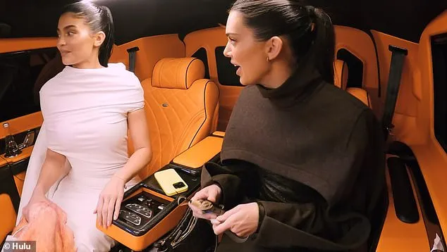 Kylie finally arrives in the car as Kendall complains that Kylie made her wait for an hour to do a photo shoot as Kylie protests, ‘Whatever! It’s Fashion Week!’